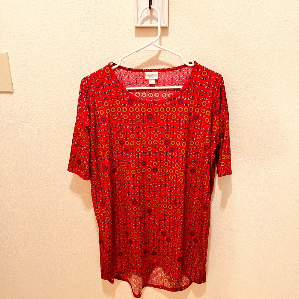 Lularoe woman’s shirt casual or dressy. Comfortable and chic!